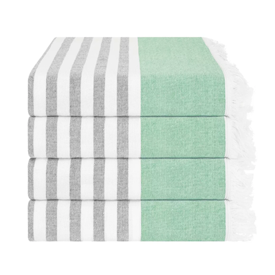 A premium high-GSM tassel beach towel made from 100% cotton with a velour front and terry back. Thick, absorbent, stylish, and perfect for vacations and poolside travel